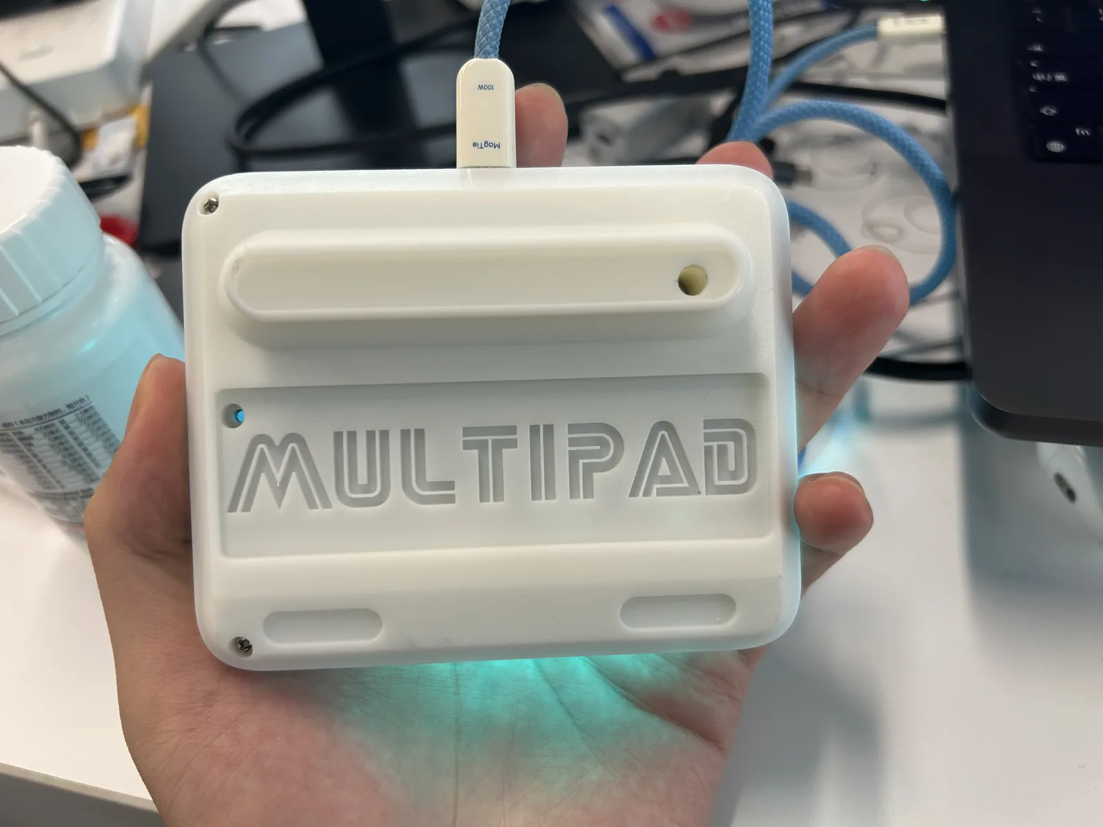 MultiPad enclosure back with a USB-C cable